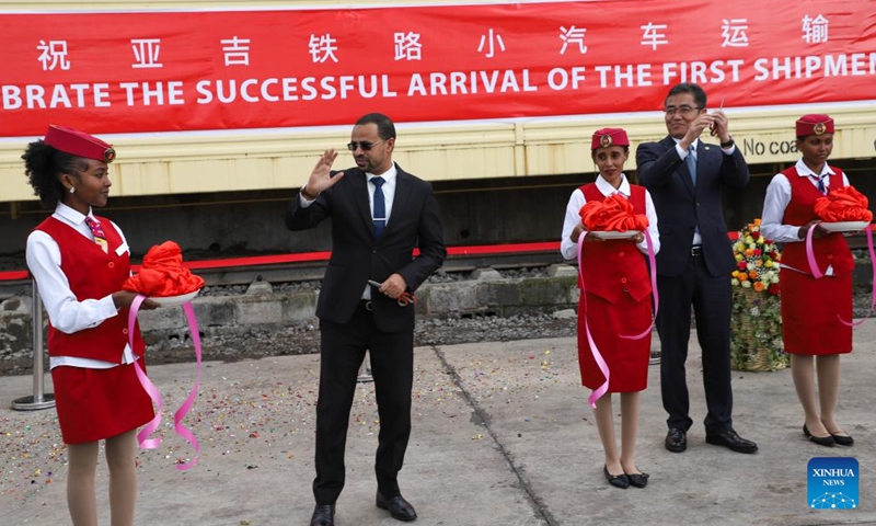 Abdi Zenebe (2nd L), the chief executive officer of Ethiopia-Djibouti Railway Share Company, attends a ceremony marking the arrival of the first vehicle shipment at the Indode Freight Station on the outskirts of Addis Ababa, Ethiopia, on Aug. 25, 2022. The Chinese-built Ethiopia-Djibouti railway on Thursday started vehicle shipment from ports in Djibouti to Addis Ababa, the Ethiopian capital. The first vehicle shipment arrived at the Indode Freight Station on the outskirts of Addis Ababa.(Photo: Xinhua)