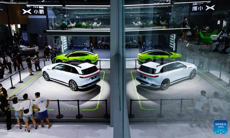 Visitors view a Buick car from SAIC-GM,<strong></strong> a joint venture between Shanghai-based SAIC Motor and General Motors, at the Chengdu Motor Show 2022 in Chengdu, capital of southwest China's Sichuan Province, Aug. 26, 2022.Photo:Xinhua