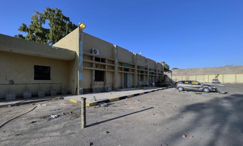 A damaged vehicle is seen after clashes in central Tripoli, Libya, on Aug. 27, 2022.Photo:Xinhua