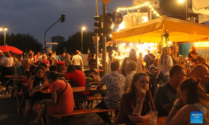 People visit the Museumsuferfest in Frankfurt am Main, Germany, on Aug 26, 2022. Frankfurt organizes the Museumsuferfest to celebrate its cultural and museum landscape from Aug 26 to 28. Photo:Xinhua