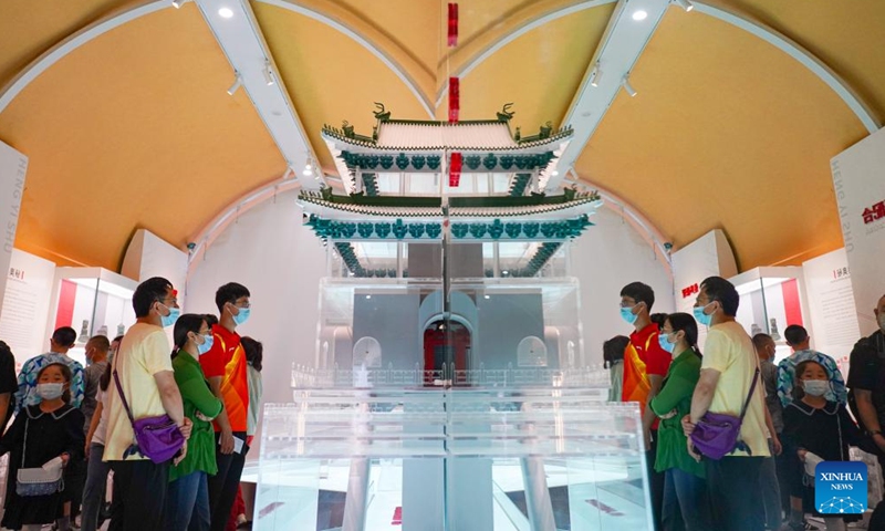 People visit an exhibition at the ground floor of Gulou, a historic drum tower, in Beijing, capital of China, Aug 28, 2022.Photo:Xinhua