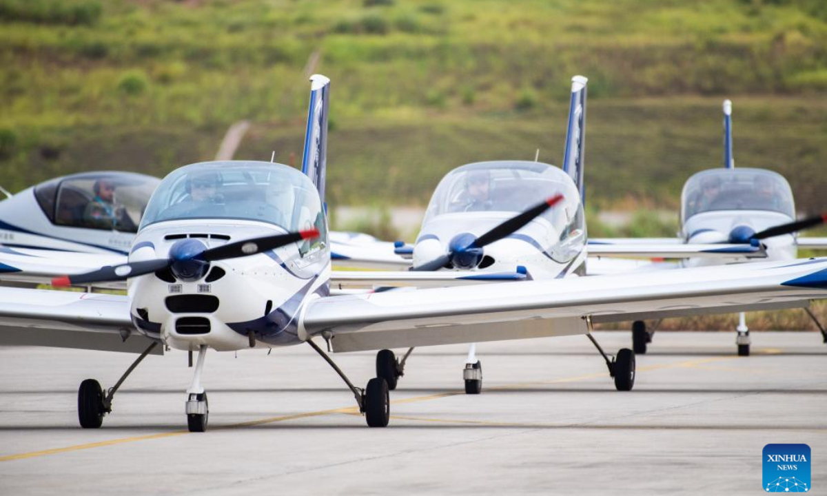 Fixed-wing aircraft return to the runway after their performance during an air show, which is a part of the 2022 Hunan (International) General Aviation Industry Expo, at the Lusong Airport of Zhuzhou City, central China's Hunan Province, Sep 1, 2022. Photo:Xinhua