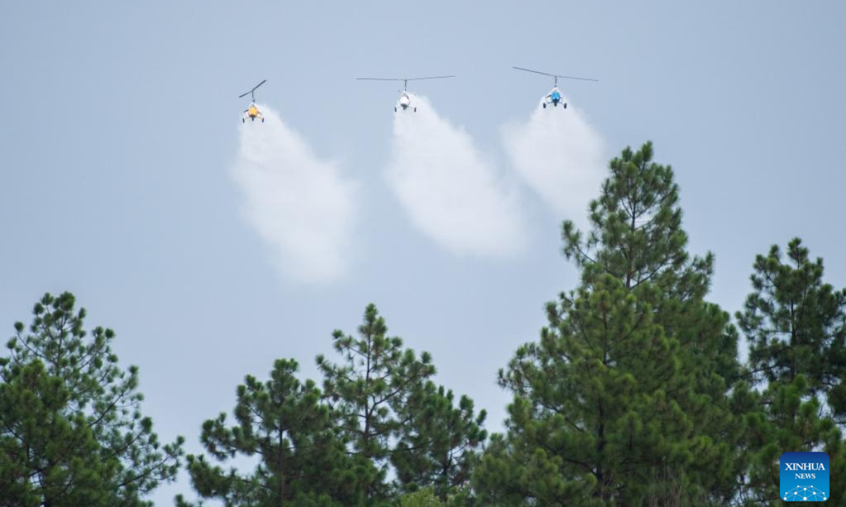 A fleet of gyroplanes fly during an air show, which is a part of the 2022 Hunan (International) General Aviation Industry Expo, at the Lusong Airport of Zhuzhou City, central China's Hunan Province, Sep 1, 2022. Photo:Xinhua