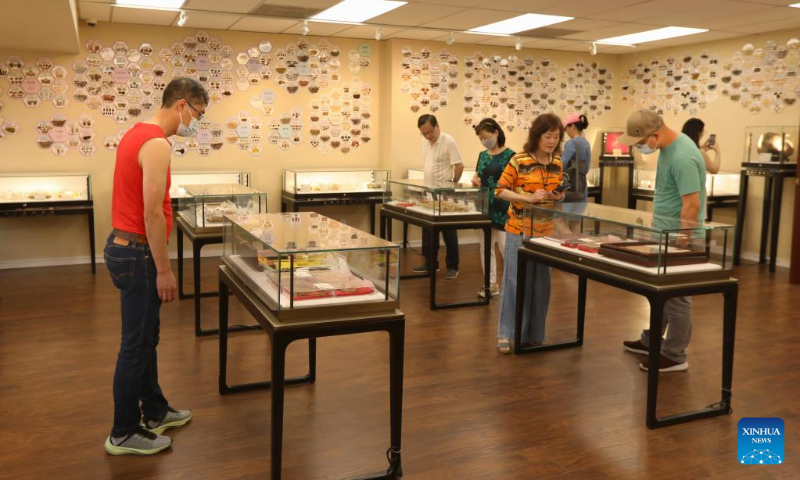 People visit the Traditional Chinese Herbal Medicine Exhibition Hall in San Francisco, the United States, Sept. 6, 2022. The Traditional Chinese Herbal Medicine Exhibition Hall opened to the public here on Sept. 3. (Photo by Liu Yilin/Xinhua)
