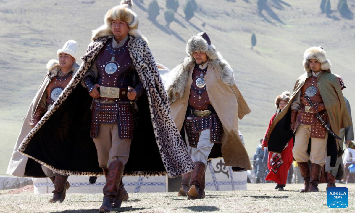 People in traditional costumes are seen during the celebration for the 31st anniversary of the independence of Kyrgyzstan in outskirts of Bishkek, Kyrgyzstan, Aug. 31, 2022. Photo:Xinhua