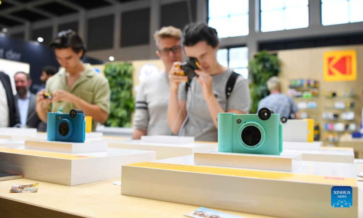 People visit the booth of Kodak during the IFA 2022 in Berlin, capital of Germany, Sep 2, 2022. The German tech fair IFA 2022 opened to the public in Berlin on Friday, for the first time since the start of the COVID-19 pandemic. In 2020, the fair was restricted to professional visitors, while last year it was canceled. Photo:Xinhua