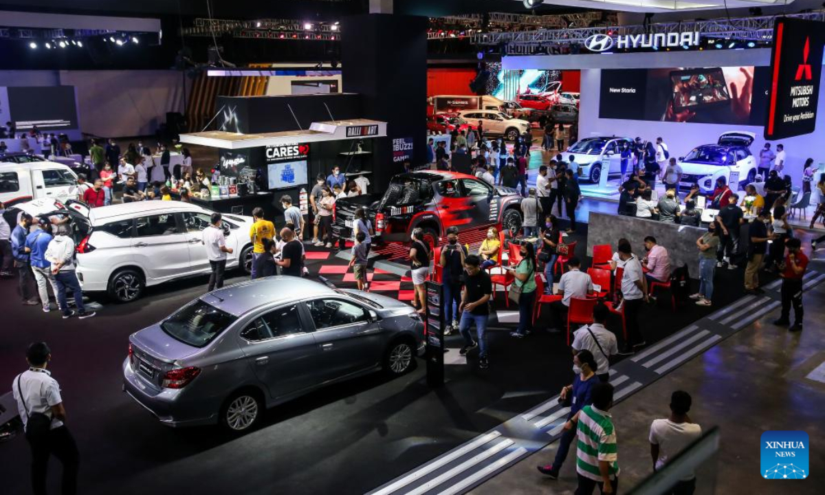 People visit the Philippine International Motor Show in Pasay City, the Philippines, Sep 17, 2022. Photo:Xinhua