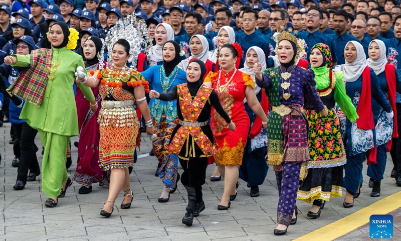 A parade is staged during the main celebration event of the National Day at the historical Dataran Merdeka, or Independence Square, in Kuala Lumpur, Malaysia, Aug. 31, 2022.(Photo: Xinhua)