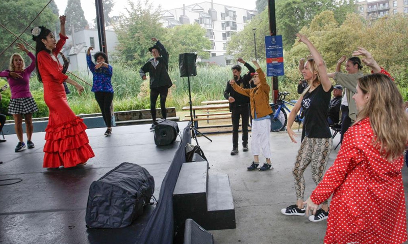 A flamenco dancer performs on stage during the Vancouver International Flamenco Festival at Granville Island in Vancouver, British Columbia, Canada, on Sept. 4, 2022. The festival runs from Sept. 3 to 25. (Photo by Liang Sen/Xinhua)