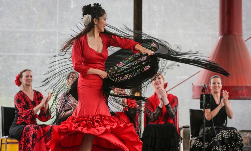 A flamenco dancer performs on stage during the Vancouver International Flamenco Festival at Granville Island in Vancouver, British Columbia, Canada, on Sept. 4, 2022. The festival runs from Sept. 3 to 25. (Photo by Liang Sen/Xinhua)