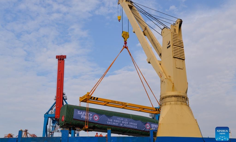 Photo taken on Sept. 2, 2022 shows a high-speed electric passenger train, customized for the Jakarta-Bandung high-speed railway, being unloaded from a vessel in Tanjung Priok Port in Jakarta, Indonesia. A high-speed electric passenger train and an inspection train, made in China and customized for the Jakarta-Bandung High-Speed Railway (HSR) project, arrived in the Jakarta Port from China's Qingdao Port on Thursday. (Photo: Xinhua)