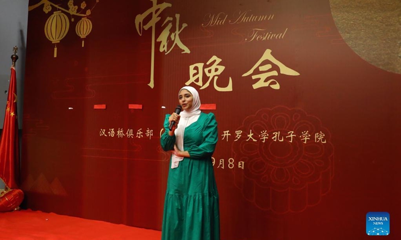 An Egyptian student performs at a Mid-Autumn Festival celebration in Cairo, Egypt, Sept. 8, 2022.(Xinhua/Ahmed Gomaa)