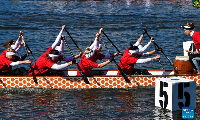 Athletes take part in a dragon boat event during Moscow City Day celebrations in Moscow, Russia, Sept. 10, 2022.Photo:Xinhua