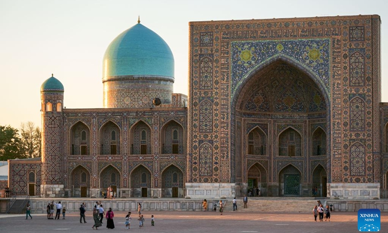 People visit the Registan Square in Samarkand, Uzbekistan, Sept. 3, 2022. Samarkand is the second largest city of Uzbekistan. It is an ancient city on the Silk Road and a melting port of the world's cultures.(Photo: Xinhua)