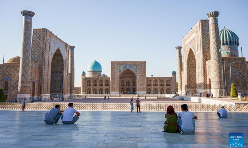 People visit the Registan Square in Samarkand, Uzbekistan, Sept. 3, 2022. Samarkand is the second largest city of Uzbekistan. It is an ancient city on the Silk Road and a melting port of the world's cultures.(Photo: Xinhua)