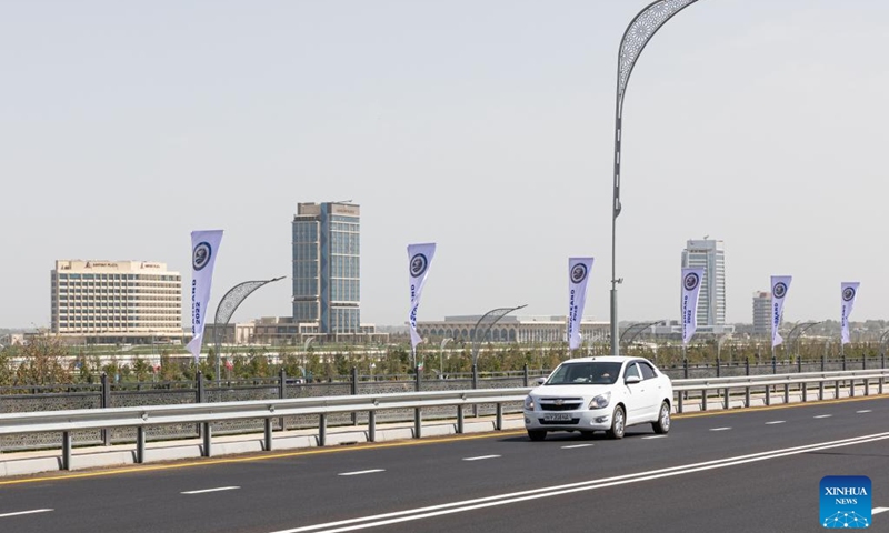 A car runs on a road in Samarkand, Uzbekistan on Sept. 12, 2022. The 22nd meeting of the Council of Heads of State of the Shanghai Cooperation Organization (SCO) will be held in Samarkand.(Photo: Xinhua)