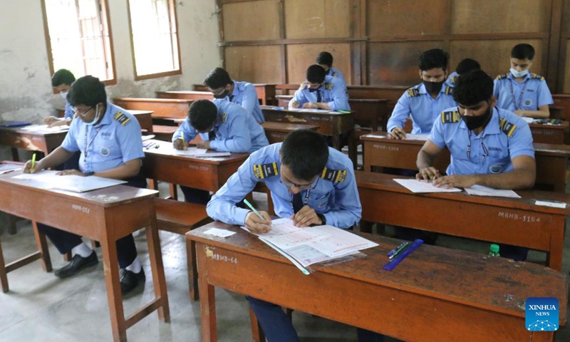 Students take exam at the Secondary School Certificate (SSC) examination site in Dhaka, Bangladesh on Sept. 15, 2022. Bangladesh's Secondary School Certificate (SSC) and equivalent exams, which are the country's largest public exams for school students, began on Thursday. Over 2 million Bangladeshi students have registered for the SSC and equivalent exams this year, which are considered one of the most important events in the lives of the Bangladeshi students.(Photo: Xinhua)