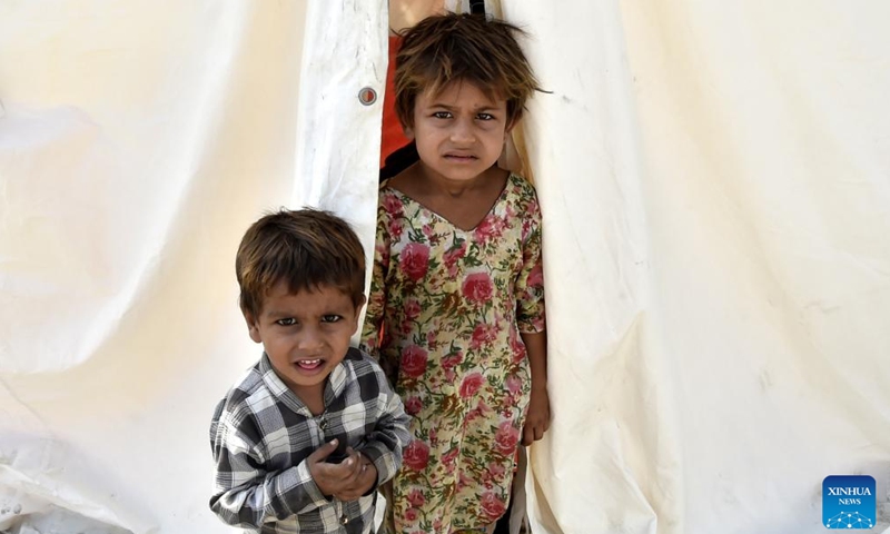 Flood-affected children are seen at a camp in northwest Pakistan's Charsadda on Sept. 18, 2022.Photo:Xinhua