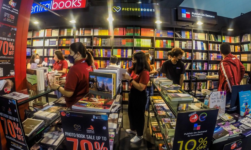 People read books during the Manila International Book Fair in Pasay City, the Philippines, Sept. 18, 2022.Photo:Xinhua