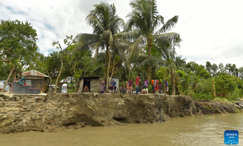 Photo taken on Sept. 19, 2022 shows the eroded river bank in Munshiganj district, Bangladesh. Residents of a village in Munshiganj district have lived amid worries over the last couple of months since Padma river took a serious turn at the start of this monsoon and continued devouring most of the homesteads and vast croplands.(Photo: Xinhua)