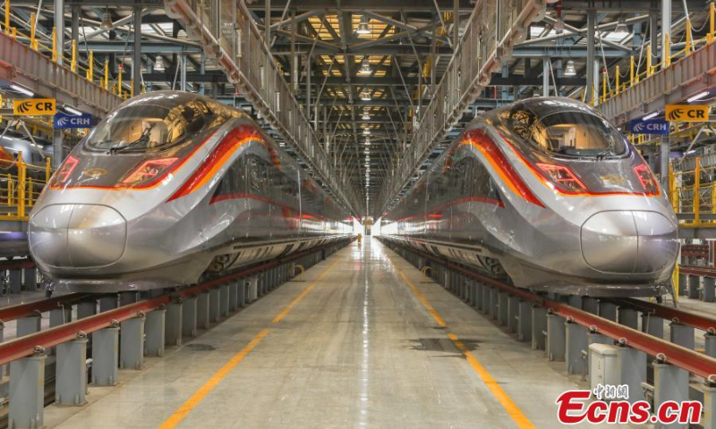 Fuxing bullet intelligent trains make debut at a maintenance station of Nanchang Railway in Nanchang, east China's Jiangxi Province, Oct. 8, 2022. (Photo: China News Service/Liu Lixin)