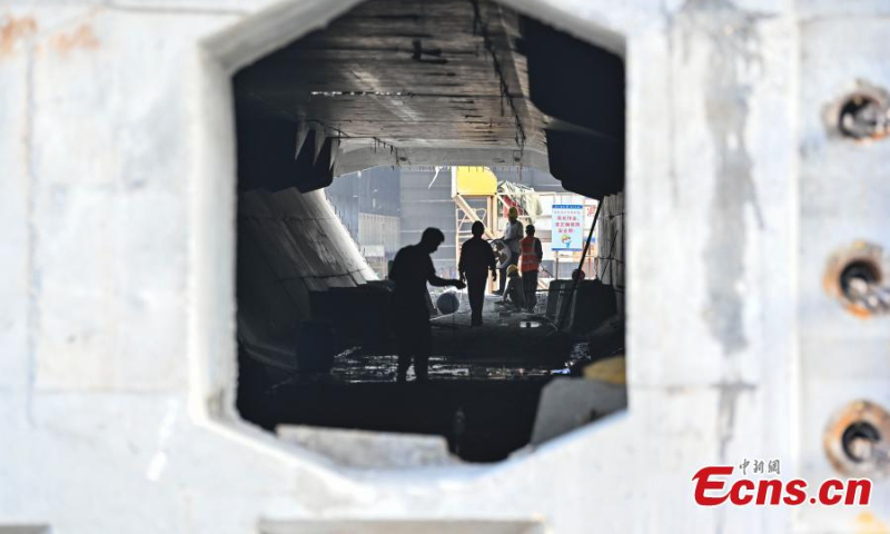 Workers work at the construction site in Zhongshan, south China's Guangdong Province, Oct. 8, 2022. (Photo: China News Service/Chen Jimin)