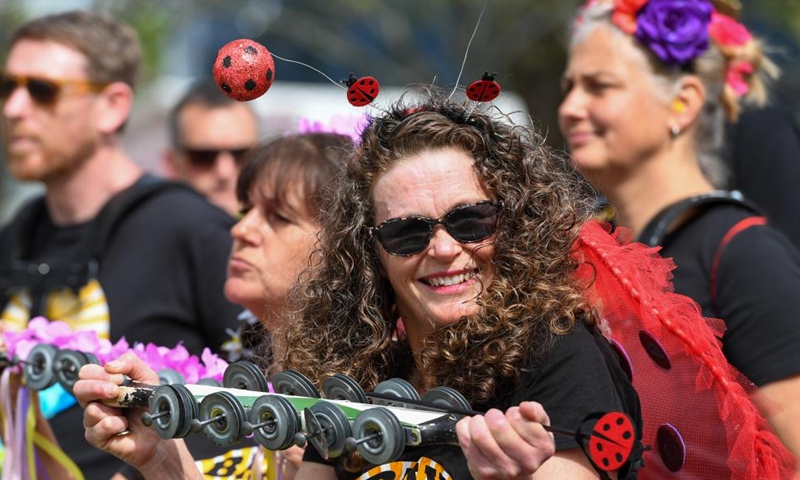 People participate in the Hastings Blossom Parade in Hastings, New Zealand, Sept. 24, 2022.Photo:xinhua