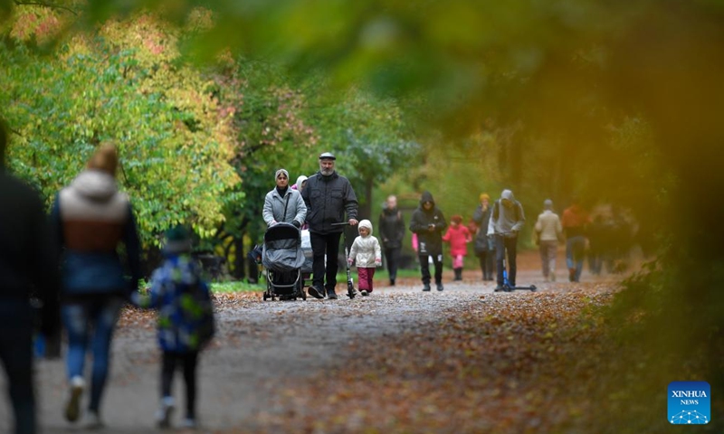 People walk at a park in Moscow, Russia, on Sept. 25, 2022.Photo:Xinhua