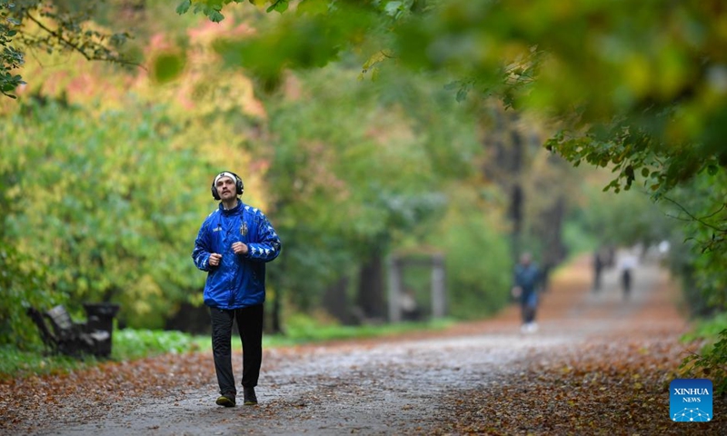 A man runs at a park in Moscow, Russia, on Sept. 25, 2022.Photo:Xinhua