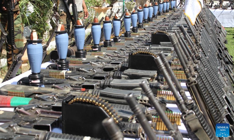 Photo taken on Sept. 25, 2022 shows the weapons seized by Afghan security forces in Kunar province, Afghanistan. The Afghan security forces have collected hundreds of pieces of weapons as locals willingly handed over their arms and ammunition to local authorities in Afghanistan's eastern Kunar province on Sunday.(Photo: Xinhua)