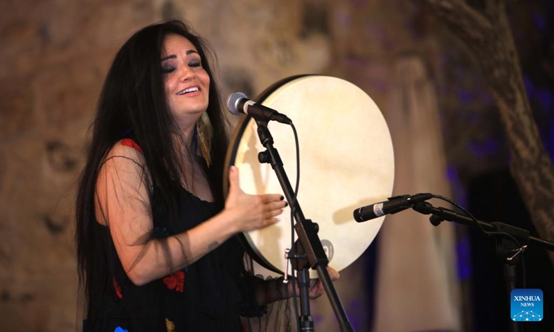 An artist performs during the Amman Jazz Festival in the town of Al-Fuheis near Amman, Jordan, on Sept. 27, 2022.(Photo: Xinhua)