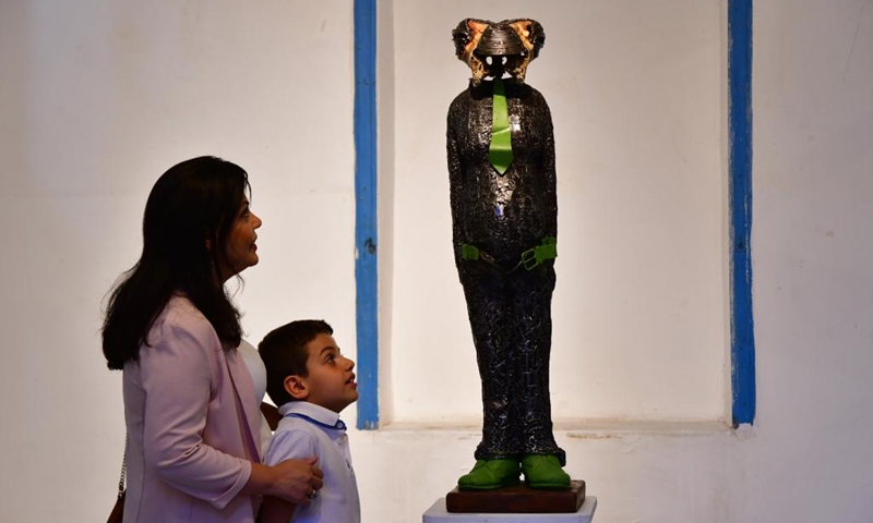 Visitors view a sculpture at a sculpture gallery in Damascus, Syria, Sept. 27, 2022.(Photo: Xinhua)