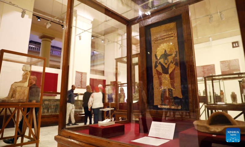 People visit a temporary exhibition of antiquities at Egyptian Museum in Cairo, Egypt, on Sept. 27, 2022. The Egyptian Museum on Tuesday opened a temporary exhibition of antiquities to mark World Tourism Day, which coincides this year with the 200th anniversary of the creation of the field of Egyptology and the decoding of ancient hieroglyphs.(Photo: Xinhua)