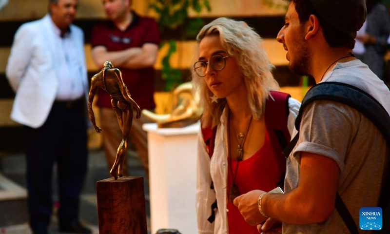 Visitors view a sculpture at a sculpture gallery in Damascus, Syria, Sept. 27, 2022.(Photo: Xinhua)