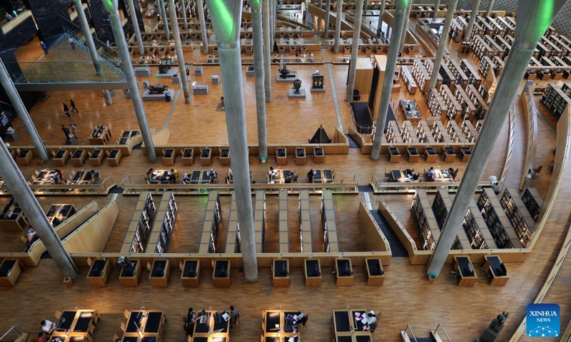 Photo taken on Sept. 27, 2022 shows a view of Bibliotheca Alexandrina in Alexandria, Egypt. Bibliotheca Alexandrina, a massive unique library and cultural symbol of the Egyptian Mediterranean coastal city of Alexandria which was founded by King Alexander the Great some 2,300 years ago, features a disc-shaped exterior and 11 internal levels, all under one glistening, tilting roof.(Photo: Xinhua)