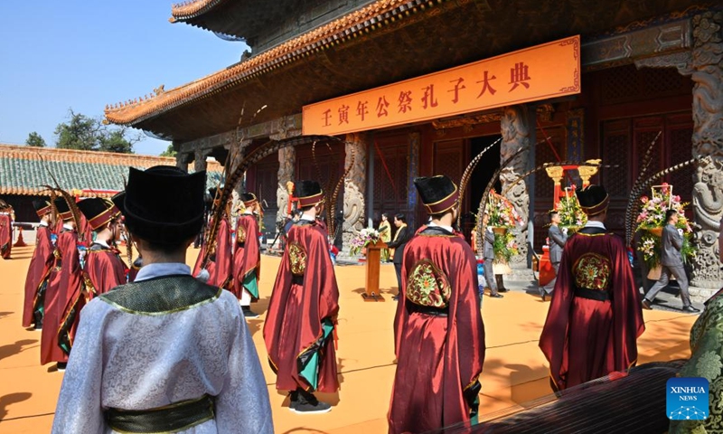 A ceremony marking the 2,573rd birth anniversary of Confucius is held at Confucius Temple in Qufu, east China's Shandong Province, Sept. 28, 2022. An educator and philosopher, Confucius (551-479 B.C.), who founded a school of thought known as Confucianism, profoundly influenced later generations of Chinese society. He was also the first to set up private schools in China that enrolled students from different social classes.(Photo: Xinhua)