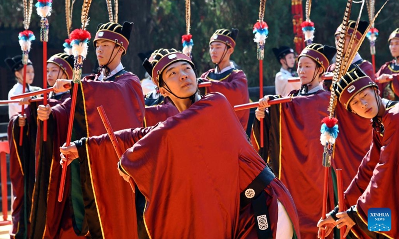 A ceremony marking the 2,573rd birth anniversary of Confucius is held at Confucius Temple in Qufu, east China's Shandong Province, Sept. 28, 2022. An educator and philosopher, Confucius (551-479 B.C.), who founded a school of thought known as Confucianism, profoundly influenced later generations of Chinese society. He was also the first to set up private schools in China that enrolled students from different social classes.(Photo: Xinhua)