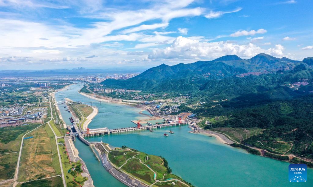 Aerial photo taken on Aug. 9, 2022 shows the Datengxia Gorge water conservancy project which is under construction and its surrounding area in south China's Guangxi Zhuang Autonomous Region. (Xinhua/Cao Yiming)