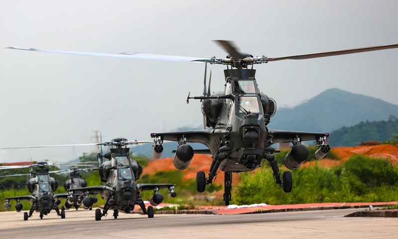 Attack helicopters attached to an army aviation brigade under the PLA Eastern Theater Command lift off in turn for a flight training exercise on September 14, 2022.Photo:eng.chinamil.com.cn