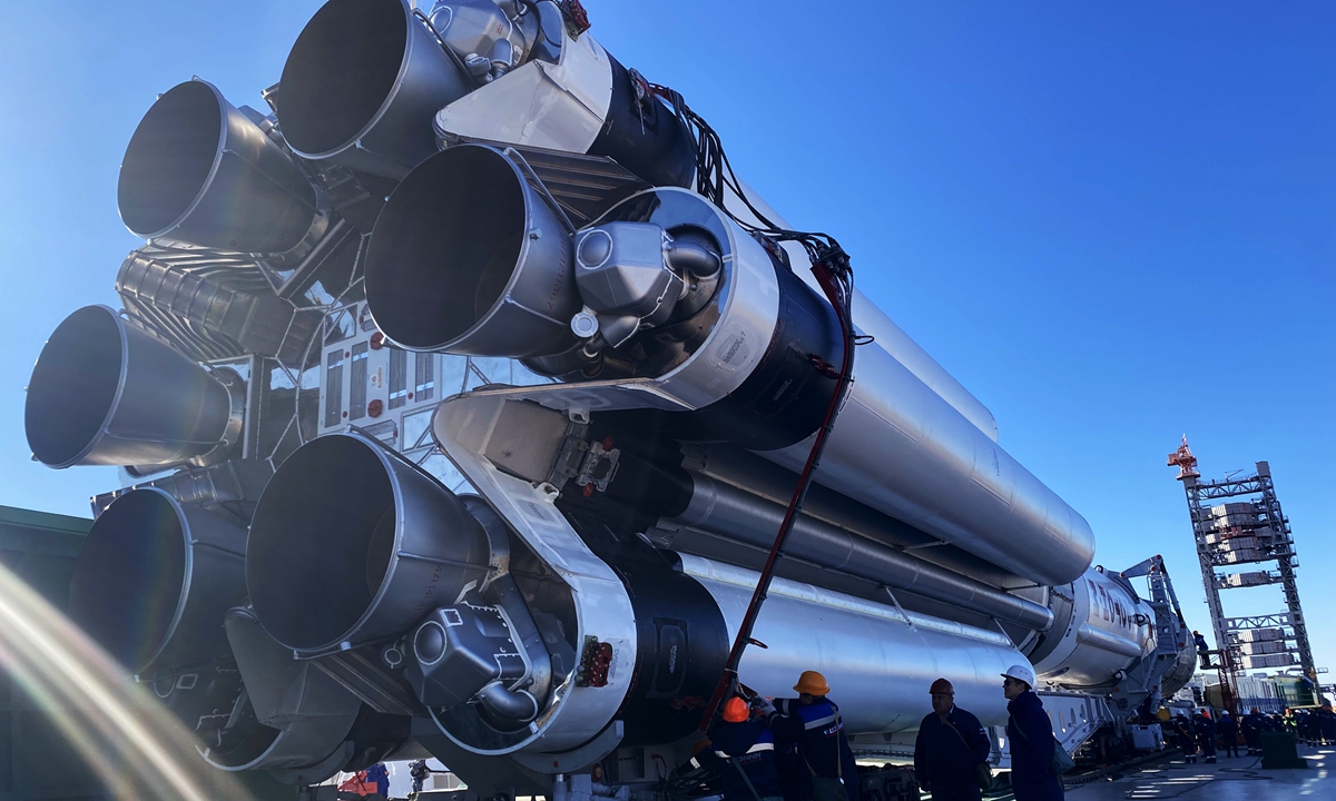 In this handout photo released by the Russian Space Agency Roscosmos, a Proton-M carrier rocket carrying the communications satellite AngoSat-2, a joint space project of Russia and Angola, is transported to a launchpad at the Baikonur Cosmodrome, Kazakhstan. Photo: VCG