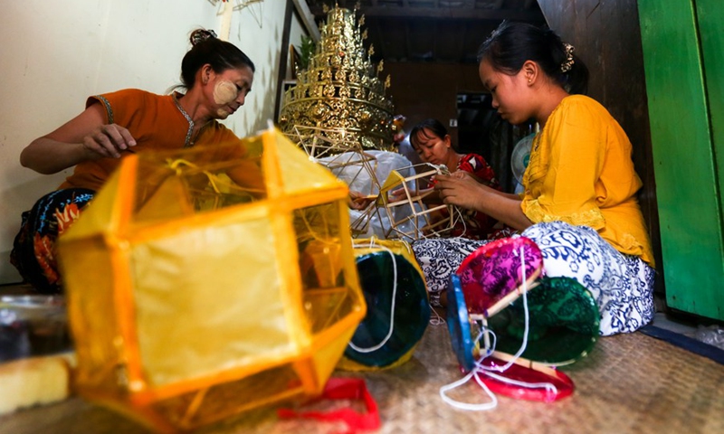 Lantern makers make traditional lanterns for Thadingyut lighting festival in Yangon, Myanmar, Oct. 7, 2022.(Photo: Xinhua)