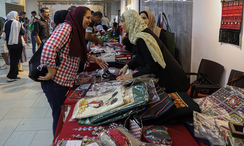 People attend a festival held to celebrate Palestinian National Heritage Day, in Gaza City, Oct. 11, 2022.(Photo: Xinhua)