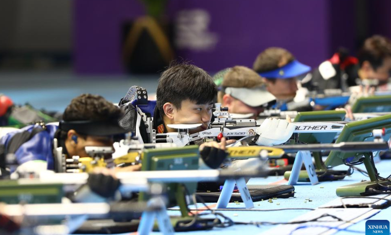 Liu Yukun (2nd L) of China competes during the men's 50m rifle 3 positions ranking match at the ISSF World Championship Rifle/Pistol in Cairo, Egypt, Oct. 22, 2022. Photo: Xinhua