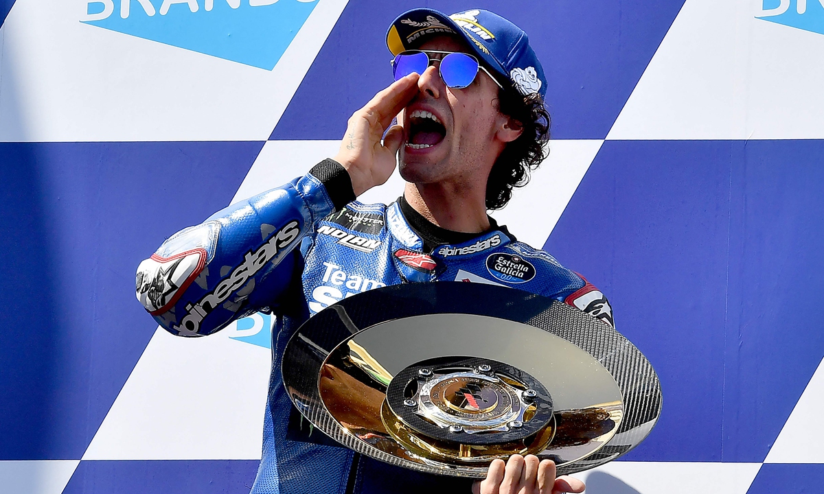 Suzuki Ecstar's Spanish rider Alex Rins celebrates his victory on the podium of MotoGP after Australian Grand Prix at Phillip Island on October 16, 2022. Photo: VCG