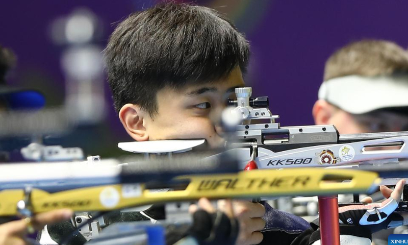 Liu Yukun (C) of China competes during the men's 50m rifle 3 positions ranking match at the ISSF World Championship Rifle/Pistol in Cairo, Egypt, Oct. 22, 2022. Photo: Xinhua