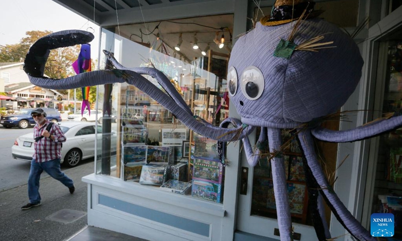 A Halloween-themed installation is displayed outside a store in Vancouver, British Columbia, Canada, on Oct. 17, 2022.(Photo: Xinhua)