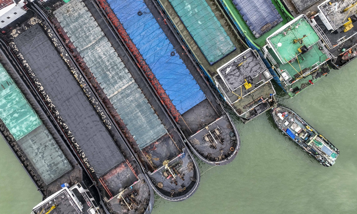 Boats dock at the local Haidian river to take shelter from Typhoon Nesat in Haikou, South China's Hainan Province on October 18, 2022. To take shelter from the strongest typhoon to hit China this year, vessels in Hainan returned to port on the day. Photo: VCG