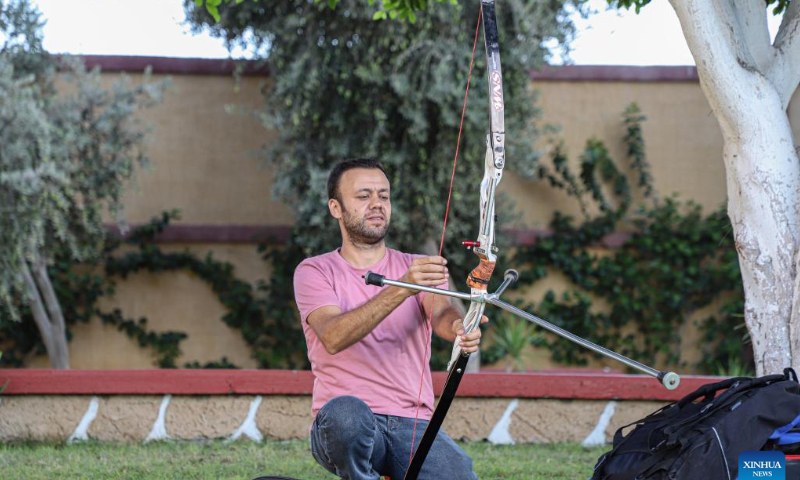 Palestinian Wasim Naief practices archery in Gaza City, Oct. 17, 2022. Armed with the bows that they have handmade themselves, Ahmed al-Zahhar and Wasim Naief, two Gaza-based young Palestinians, aspire to enter the archery competition at the 2024 Olympic Games. Photo: Xinhua