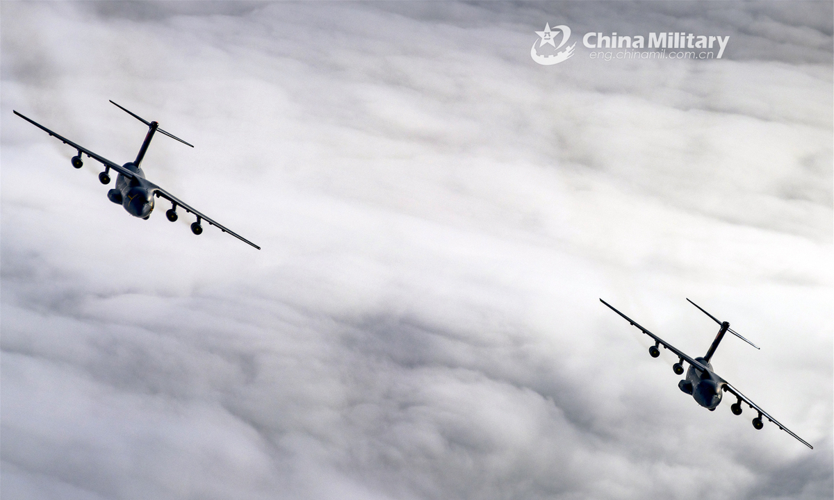 Two Y-20 transport aircraft perform parallel flying. Photo:China Military