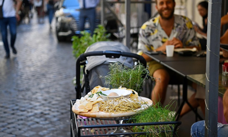 Pasta models are seen at a restaurant in Rome, Italy, on May 19, 2022.(Photo: Xinhua)